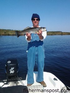 Mike Favata with a healthy speckled trout he caught and released in a creek near Havelock while fishing with Capt. Stukie Payne of Carolina Backwater Charters.