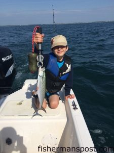 James Hurley with a spanish mackerel caught inside of the Liberty Ship on a trolled Clarkspoon while fishing with his brother (Owen) and dad (Gary).