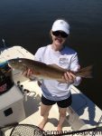 Morgan Smith with an upper-slot red drum that struck a topwater plug near Emerald Isle while she was fishing with Capt. Johnathan Garrett of On Point Charters.