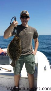 Nolan Mattress with a 4.5 lb. flounder that struck a bucktail jig at some bottom structure off Beaufort Inlet while he was fishing with Capt. Chris Kimrey of Mount Maker Charters.