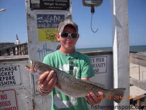 T.J. Farrington, of High Point, NC, with a 2 lb., 5 oz. speckled trout that bit a live shrimp off Oak Island Pier.