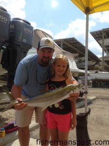 Andrew and Elizabeth Duskie with the 6 lb., 11 oz. winning spanish mackerel in the Cape Fear Anglers Spanish Mackerel Tournament. The big spaniard bit a live menhaden near a ledge in 60' of water off Carolina Beach while they were fishing with Scott Smith and Pete Bullock on the "All Mine."