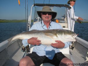 Larry Danzinger, of Toronto, Ontario, with a 40" red drum he caught and released in the lower Neuse River after it struck a D.O.A. Airhead soft plastic under a popping cork. He was fishing with Capt. Gary Dubiel of Spec Fever Guide Service.