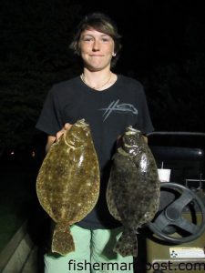 Blain Grant, of Wilmington, with two of seven flounder he hooked while casting live menhaden along grass banks in Snows Cut.