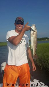 Johnnie Walker, of Murfreesboro, TN, with a 25.5" red drum that struck a soft plastic swimbait in Browns Inlet.