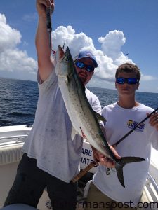 Capt. Kevin Sneed, of Rigged and Ready Charters, and Will Wright, of Washington, NC, with a 9 lb. spanish mackerel that bit a live finger mullet just off Holden Beach.