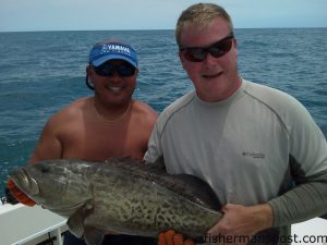 Mate Benson Ybanez and and Don Abraham, of Spokane, WA, with a 35" gag grouper that bit a live menhaden at some bottom structure in 75' of water off Bogue Inlet. The were fishing with Capt. Robbie Hall on the "Open Wide."
