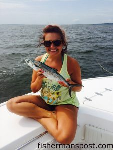 Heather Craver, of Clemmons, NC, with a spansih mackerel that bit a Clarkspoon while she was trolling off Nags Head with Capt. Ray Pugh.