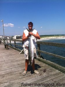 Desmond Starling with his first king mackerel, a 28.5 lb. fish that bit a live bait off Carolina Beach Pier.