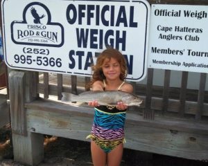 Savannah Marshall, of Chesapeake, VA, with a citation 1 lb., 10 oz. sea mullet she hooked from the beach at Frisco. Weighed in at Frisco Rod and Gun.