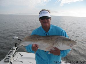 George Poveromo with a citation red drum that struck a D.O.A. soft plastic beneath a popping cork while he was fishing the Neuse River with Capt. Gary Dubiel of Spec Fever Guide Service.
