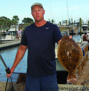 Wilmington's John Donovan with the 4.12 lb. flounder that he weighed in at the Carolina Beach Inshore Challenge, one of the three fish that made up the 16.65 lb. aggregate weight that earned him first place in the Flounder Division of the Fisherman's Post Inshore Tournament Trail. The "3 Tippetts" crew, also of Wilmington, put together a 20.22 lb. three-fish aggregate to take home the honors in the Red Drum Divsion of the Trail.