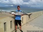 Dave Hannah, of Wilmington, with a 35 lb. king mackerel that struck a live bluefish off Johnnie Mercers Pier.