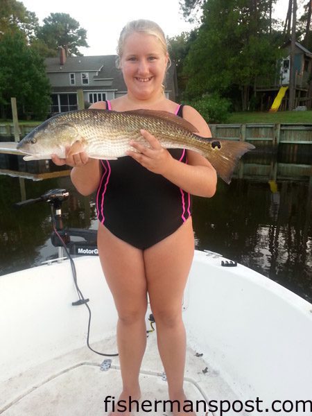 Makala Hall (age 12), of Archdale, NC, with her first red drum, a 25″ fish that bit a live finger mullet while she was fishing Davis Creek on her borther’s boat.