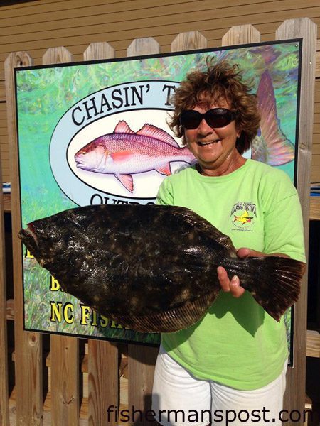 Rachel Morgan, of Beaufort, NC, with a 7.23 lb. flounder that bit a live fiddler crab near the Morehead port wall. Weighed in at Chasin’ Tails Outdoors.