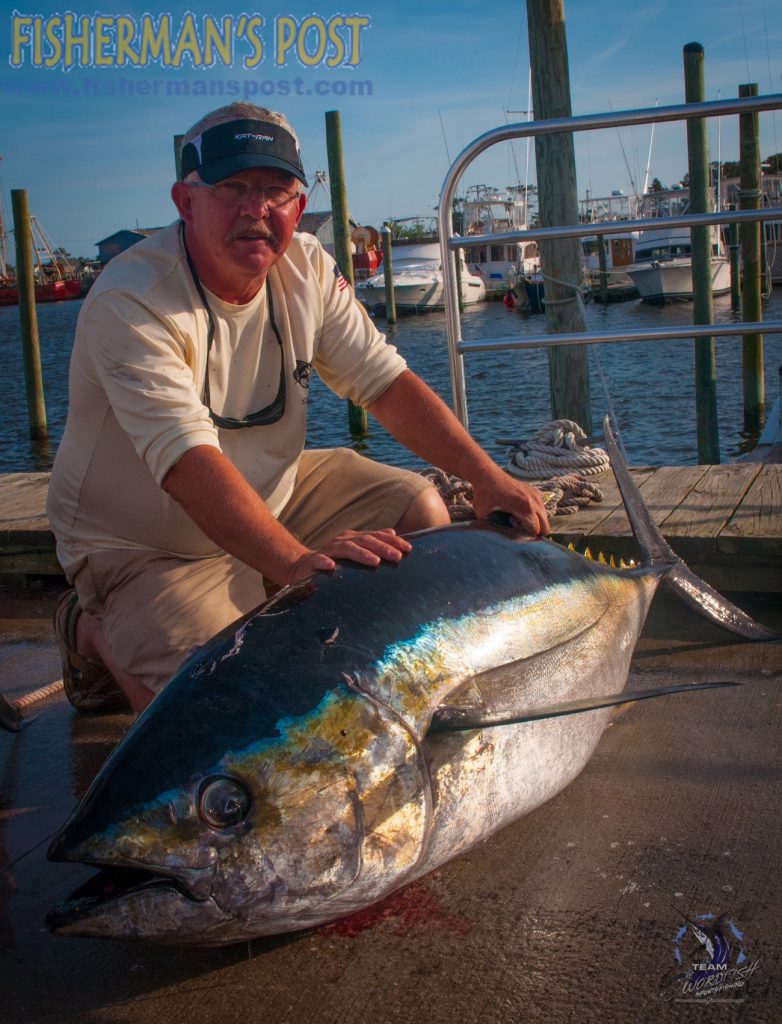 Terry Rose, of the Hillsborough Sportfishing club, with a 191 lb. bigeye tuna that struck a ballyhoo beneath a crystal sea witch while he was trolling off Oregon Inlet aboard the "Swordfish."