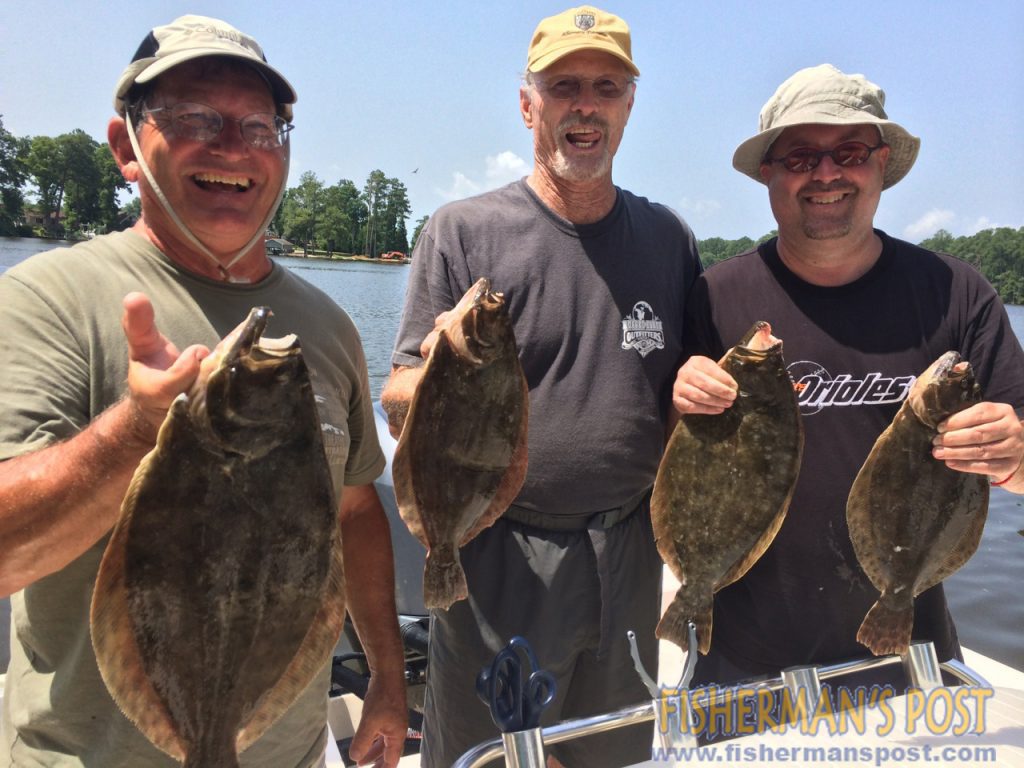 Steve, Ab, and Chris Pomp, of Suffolk, VA, with flounder they landed while casting Z-Man soft baits in the Pamlico River with Capt. Richard Andrews of Tar-Pam Guide Service.