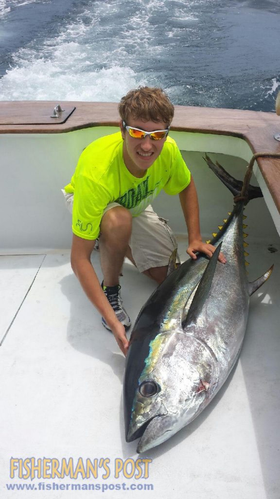 Jared Bugaj, of Wooster, Ohio, with a 146 lb. bigeye tuna he hooked while on a trolling trip out of the Oregon Inlet Fishing Center aboard the "Escape."
