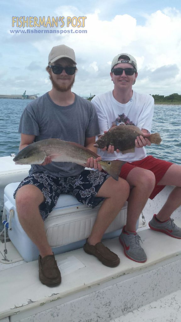 Hayes Cummings and Stephan Ford with an upper-slot red drum and a keeper flounder they hooked while soaking bait in Beaufort Inlet with Capt. Chris Kimrey of Mount Maker Charters.