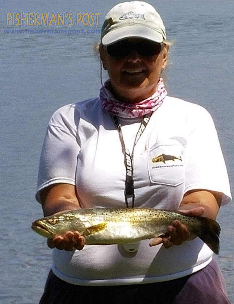 Barbara Moore with a 21" speckled trout that struck a Z-Man MinnoZ soft plastic bait in the boat basin at River Dunes in Pamlico County.