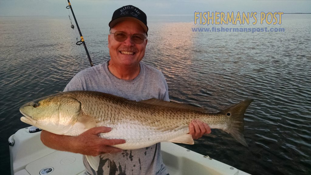 Bruce Perkins with his first red drum, a citation-class fish he hooked on a chunk of mullet while fishing the Neuse River near Oriental with Peter Overgaard.