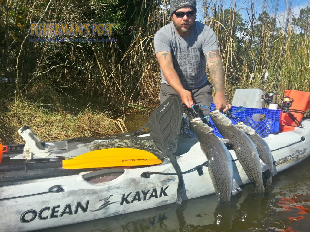 Chris Lane, of Ft. Barnwell, NC, with the 13.94 lb., three-fish stringer that earned him first place in the Pamlico Shrine Club Speckled Trout tournament. Lane hooked the fish in a lower Neuse River creek while fishing from his Ocean Kayak.