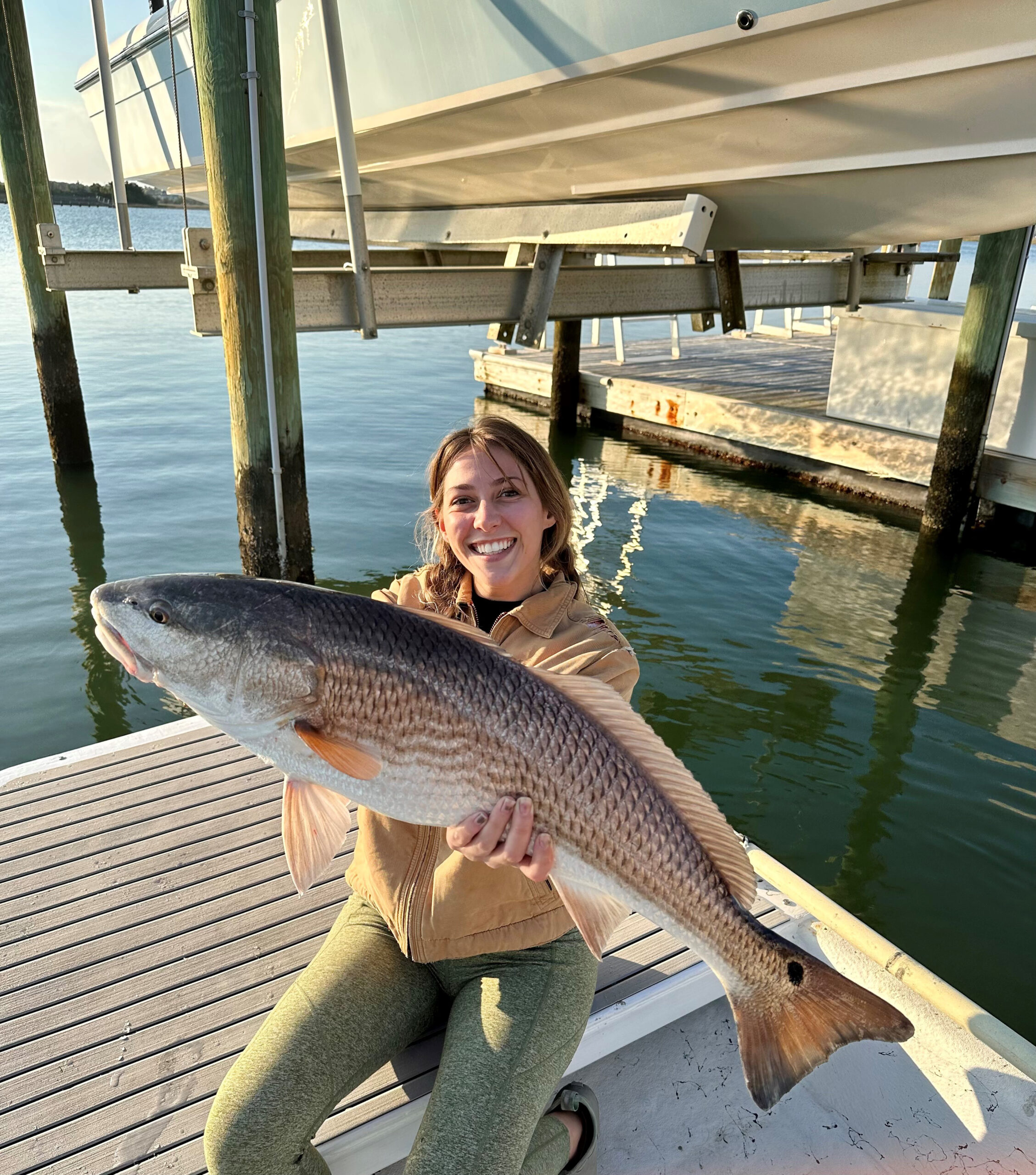 Lindsey Hurst, of Wilmington, hooked this 31″ red drum in the Wr