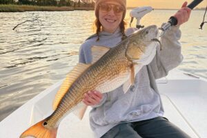 Haylee Kinlaw, of Fuquay-Varina, NC, caught this 32" red drum while fishing in Northwest Creek near New Bern. She was using a Z-Man soft plastic.