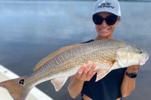 Jess O'Connor, of Chapel Hill, caught this 32" red drum in the Neuse River using a live shrimp on a popping cork. She was fishing with Capt. Daniel Griffee out of Chasin' Tails Outdoors.